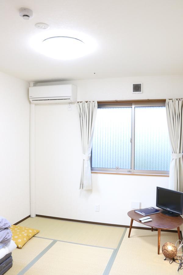 Tokiyo Hostel Toyonaka Bagian luar foto