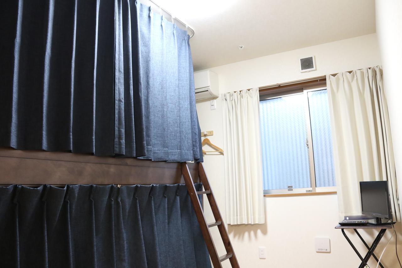 Tokiyo Hostel Toyonaka Bagian luar foto